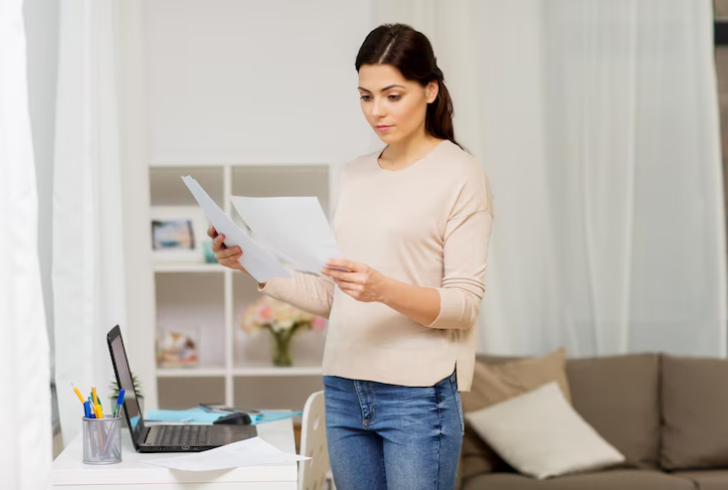 Self-employed woman checking her documents for mortgage