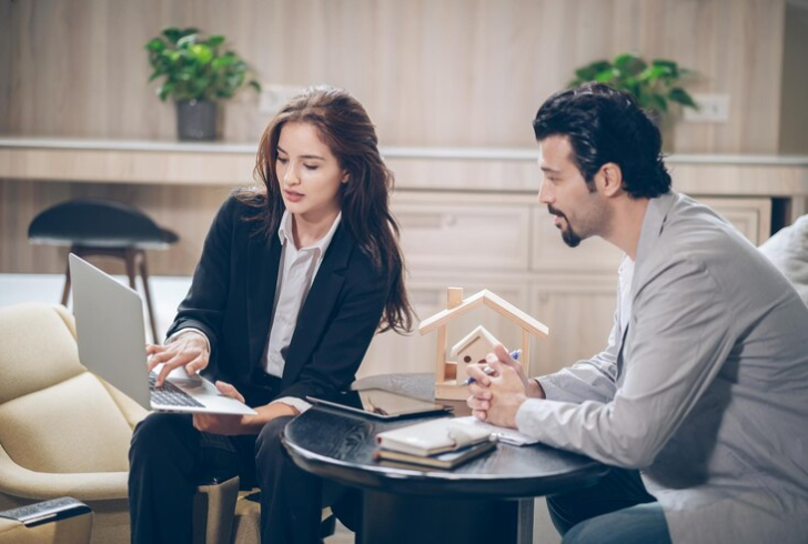 Homebuyer discussing mortgage options with a loan officer